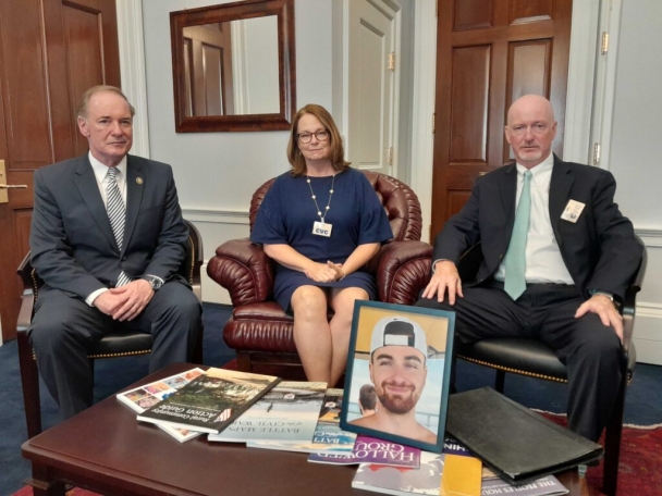  Deb and Ray Cullen, of Shippingport, Pa., center and right, show a photo of their son, Zachary, in the office of their congressman, GOP Rep. John Joyce, left. Zachary died nine months ago at 23 of fentanyl poisoning. The Cullens traveled to the U.S. Capitol May 25, 2023 to watch the House vote on the HALT Fentanyl Act. (Photo by Ashley Murray/States Newsroom)